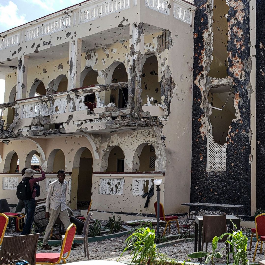 A hotel in the Somalian city of Kismayo on July 13, 2019, a day after at least 26 people, including several foreigners, were killed and 56 people were injured in a suicide bomb and gun attack claimed by al Shabaab militants. A hotel in the Somalian city of Kismayo on July 13, 2019, a day after at least 26 people, including several foreigners, were killed and 56 people were injured in a suicide bomb and gun attack claimed by al Shabaab militants.