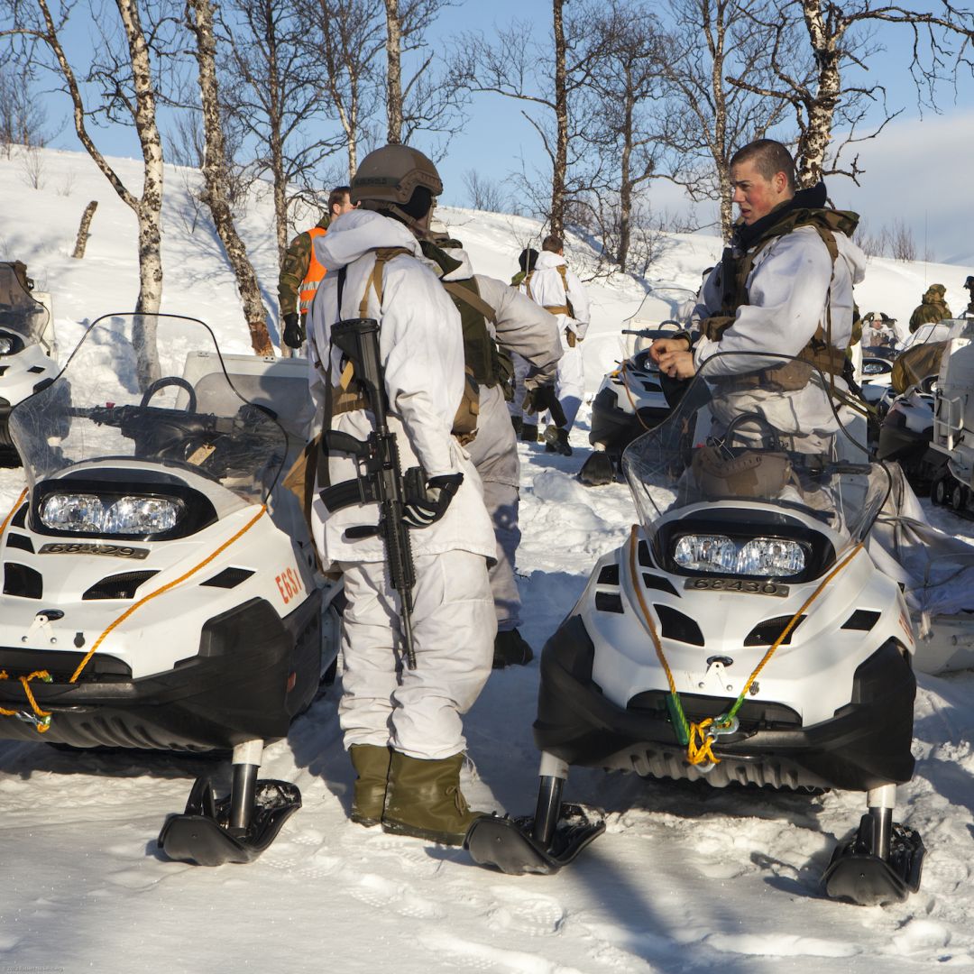 Norwegian army soldiers use snowmobiles for mobility during a military exercise on March 6, 2013, in Skjold, Norway. 