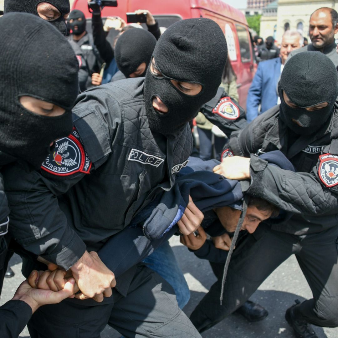 In this photograph, Armenian police arrest a man during a protest in Yerevan, the country's capital, on April 22, 2018. 