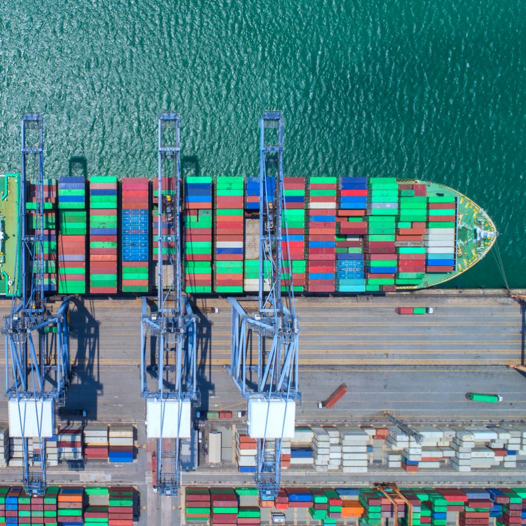The escalating trade war between China and the United States has placed Southeast Asian countries in the crossfire. An aerial view of harbored shipping cargo.