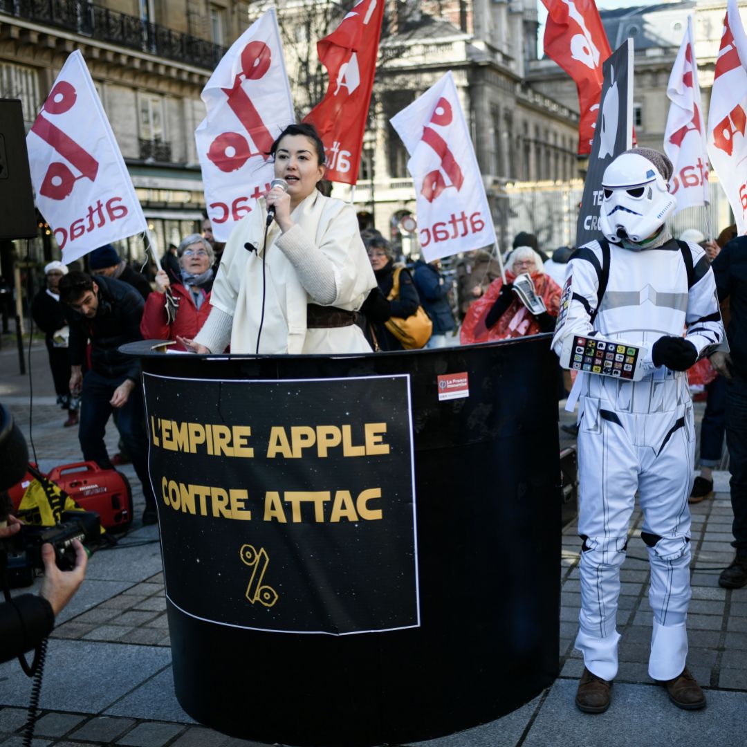 Members of the French activist group Attac rally in Paris on Feb. 12, 2018, against Apple Inc., which they accuse of tax evasion.