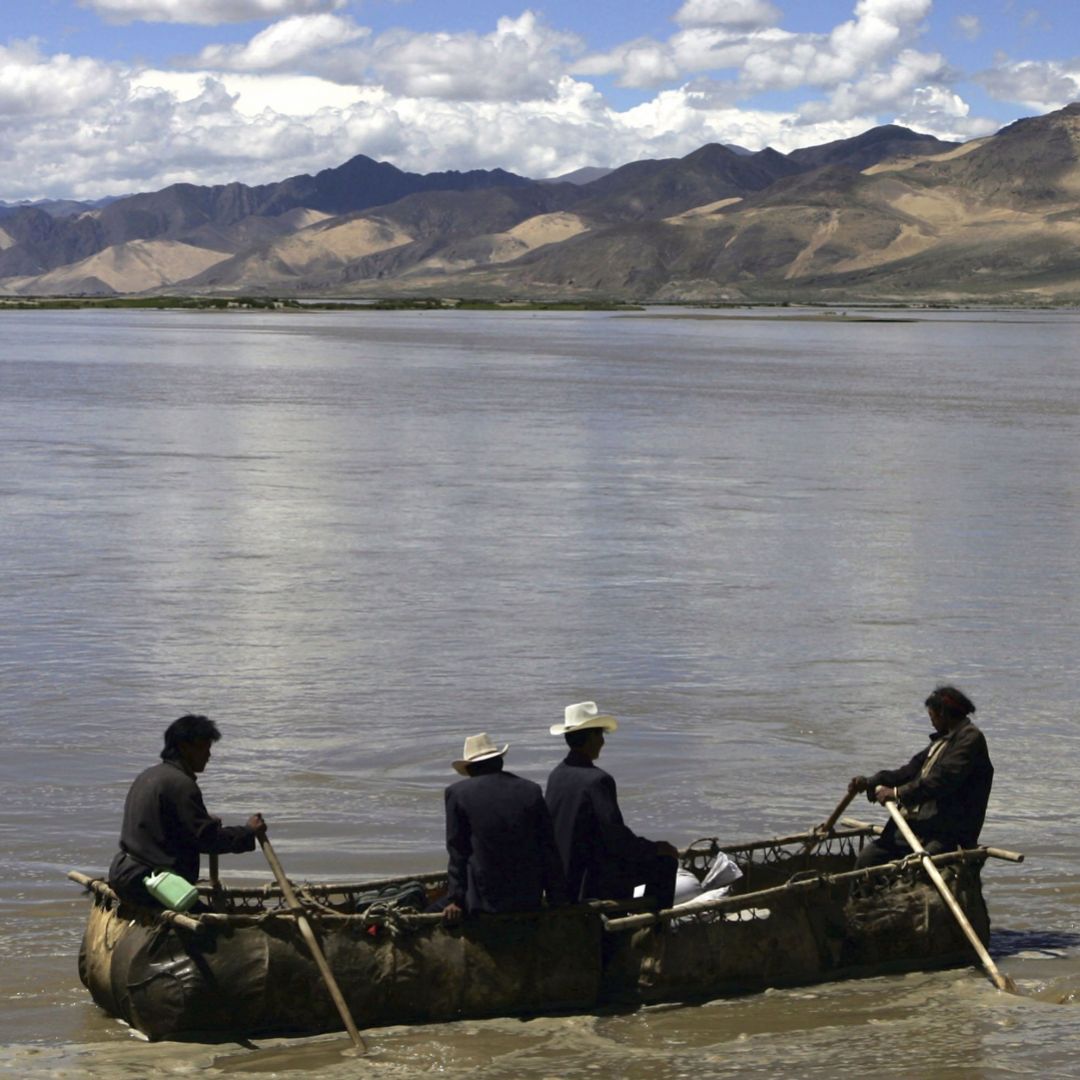 Tibetans row along the Brahmaputra River, which has recently been the subject of dispute between China and India. Tibetans row along the Brahmaputra River, which has recently been the subject of dispute between China and India.