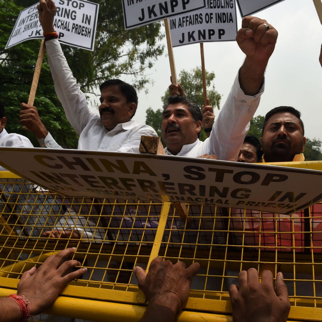 Indian demonstrators gather near the Chinese Embassy in India's capital to protest China's activities in Bhutan.