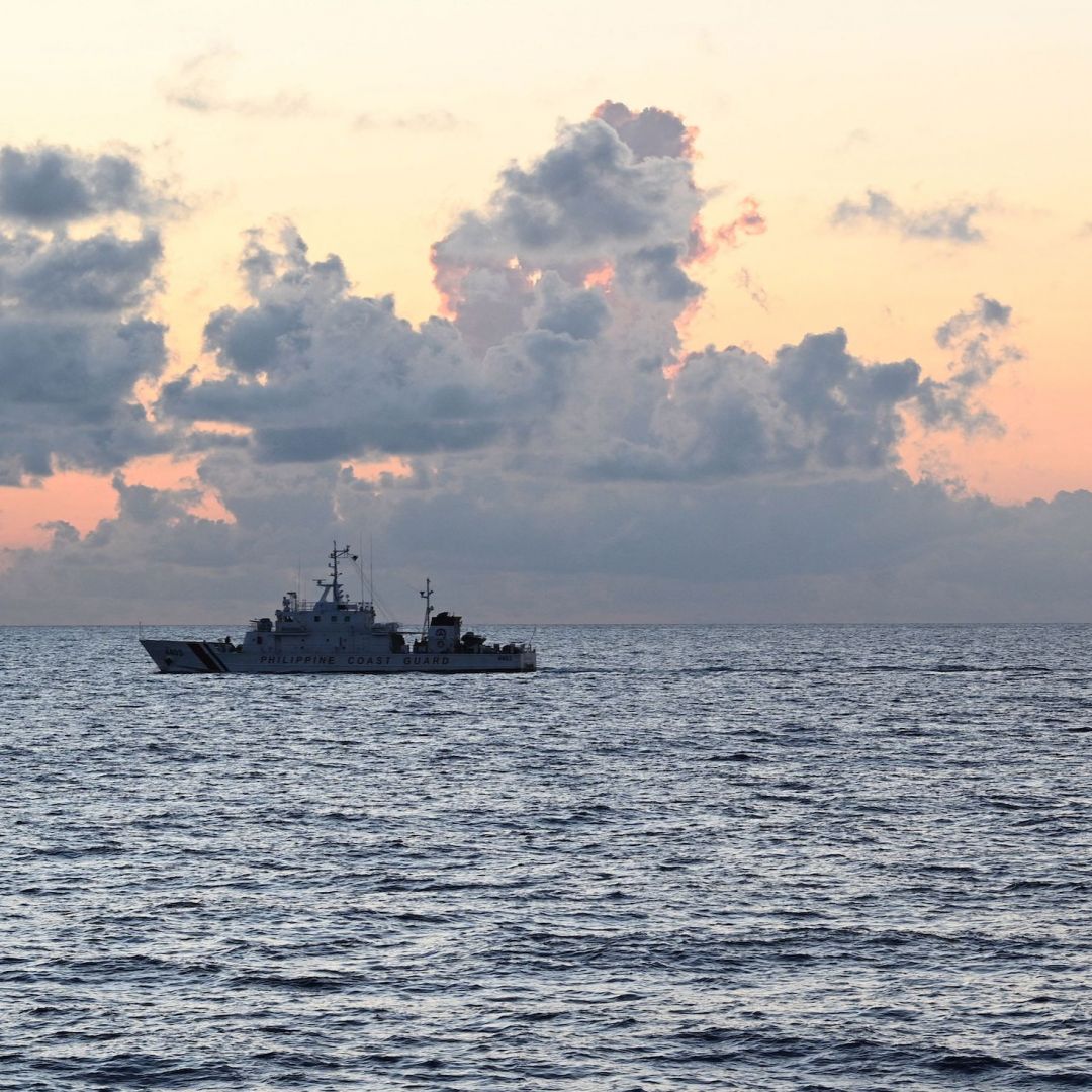 A Chinese coast guard ship (R) shadows the Philippine coast guard vessel BRP Malapascua (L) while on patrol at the Second Thomas Shoal in the Spratly Islands in the disputed South China Sea on April 23, 2023. A Chinese coast guard ship (R) shadows the Philippine coast guard vessel BRP Malapascua (L) while on patrol at the Second Thomas Shoal in the Spratly Islands in the disputed South China Sea on April 23, 2023.