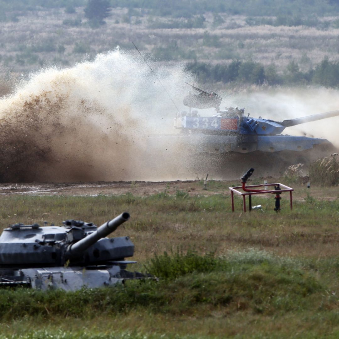A Chinese battle tank competes in a tank biathlon event held by the Russian military on Aug. 27, 2022, outside of Moscow, Russia. 