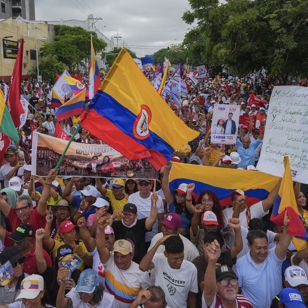 Supporters of Colombian presidential candidate Ivan Cepeda wave flags ahead of his closing campaign rally in Barranquilla, Colombia, on May 24, 2026. Supporters of Colombian presidential candidate Ivan Cepeda wave flags ahead of his closing campaign rally in Barranquilla, Colombia, on May 24, 2026.