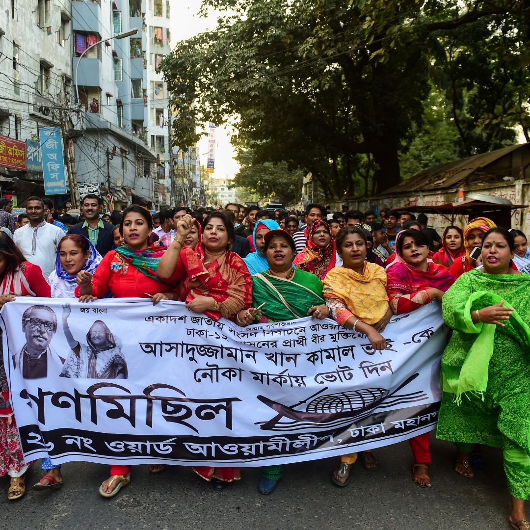 Supporters of Bangladesh's Awami League march during a general election campaign procession in the capital of Dhaka on Dec. 10, 2018.