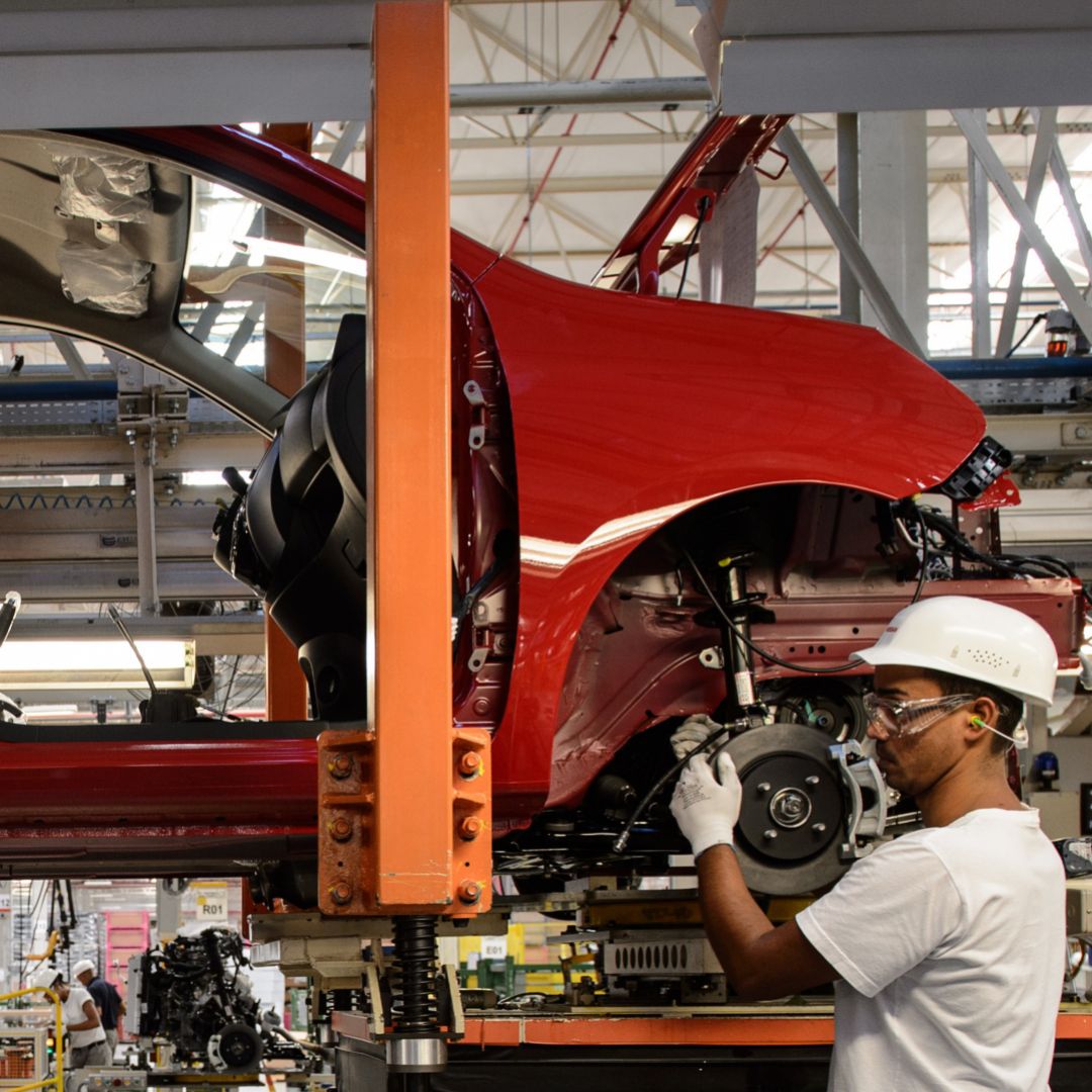 Workers assemble cars at the Nissan plant in Resende, Brazil, during February 2015. Most major automakers have factories in Brazil and Argentina.