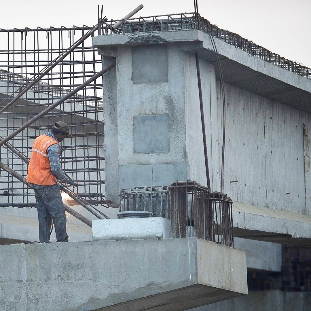 An Indian man works at a construction site for the Asian Highway project, which connects Nepal, India and Bangladesh.