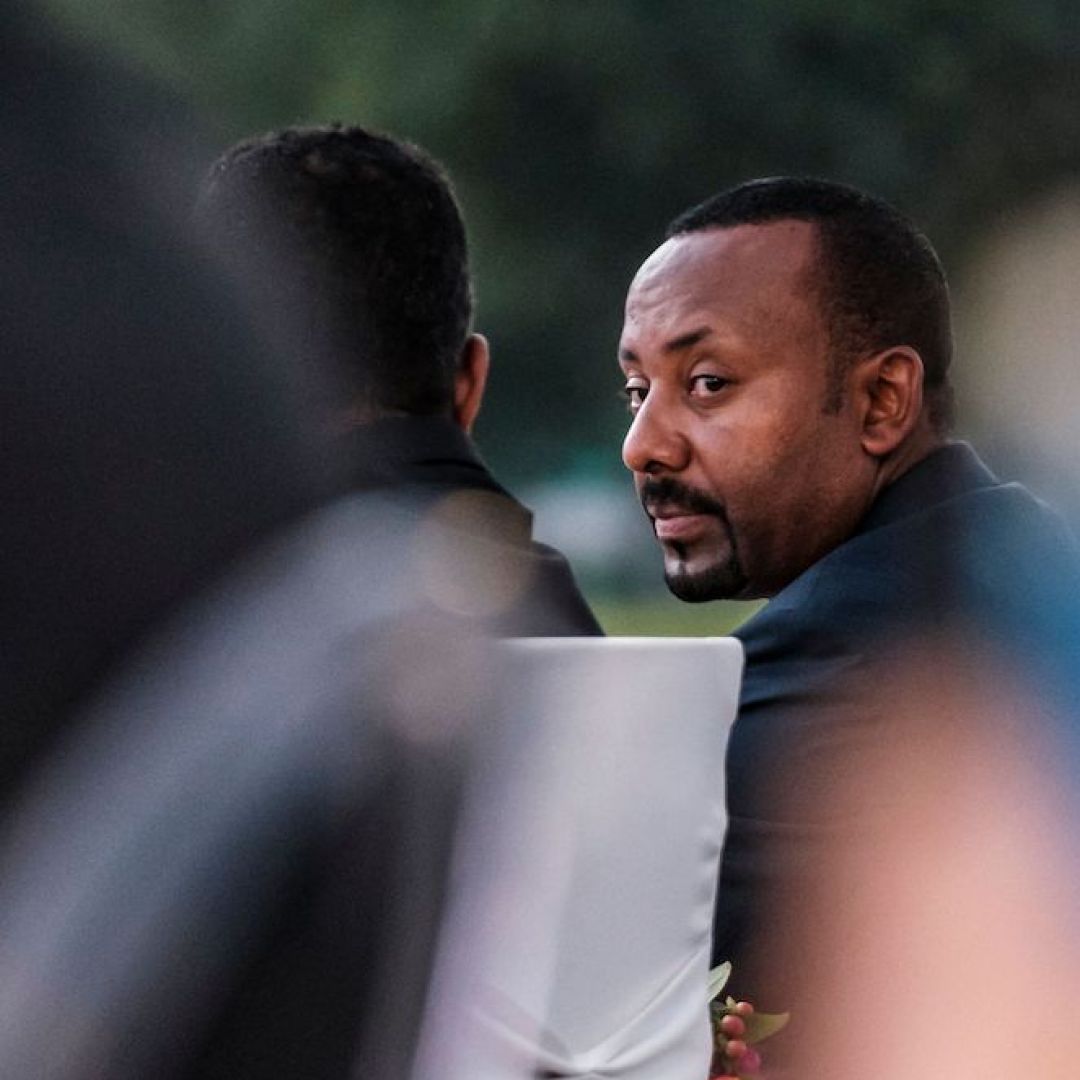 Ethiopian Prime Minister Abiy Ahmed is seen at a ceremony for the signing of a telecom licensing agreement on June 8, 2021. 