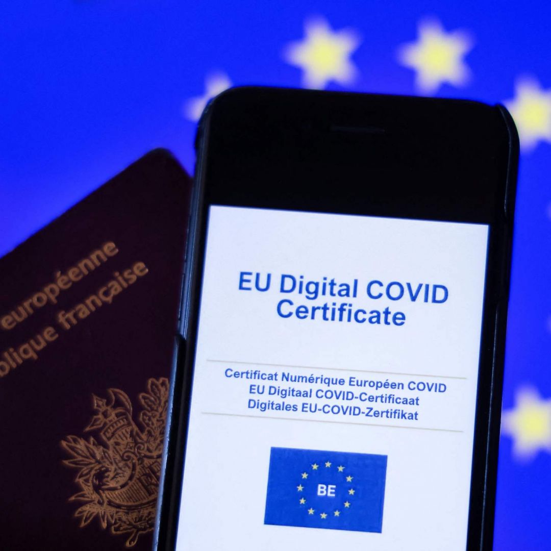 The European Union’s COVID-19 health certificate is seen on the screen of a phone in Brussels on June 16, 2021. 