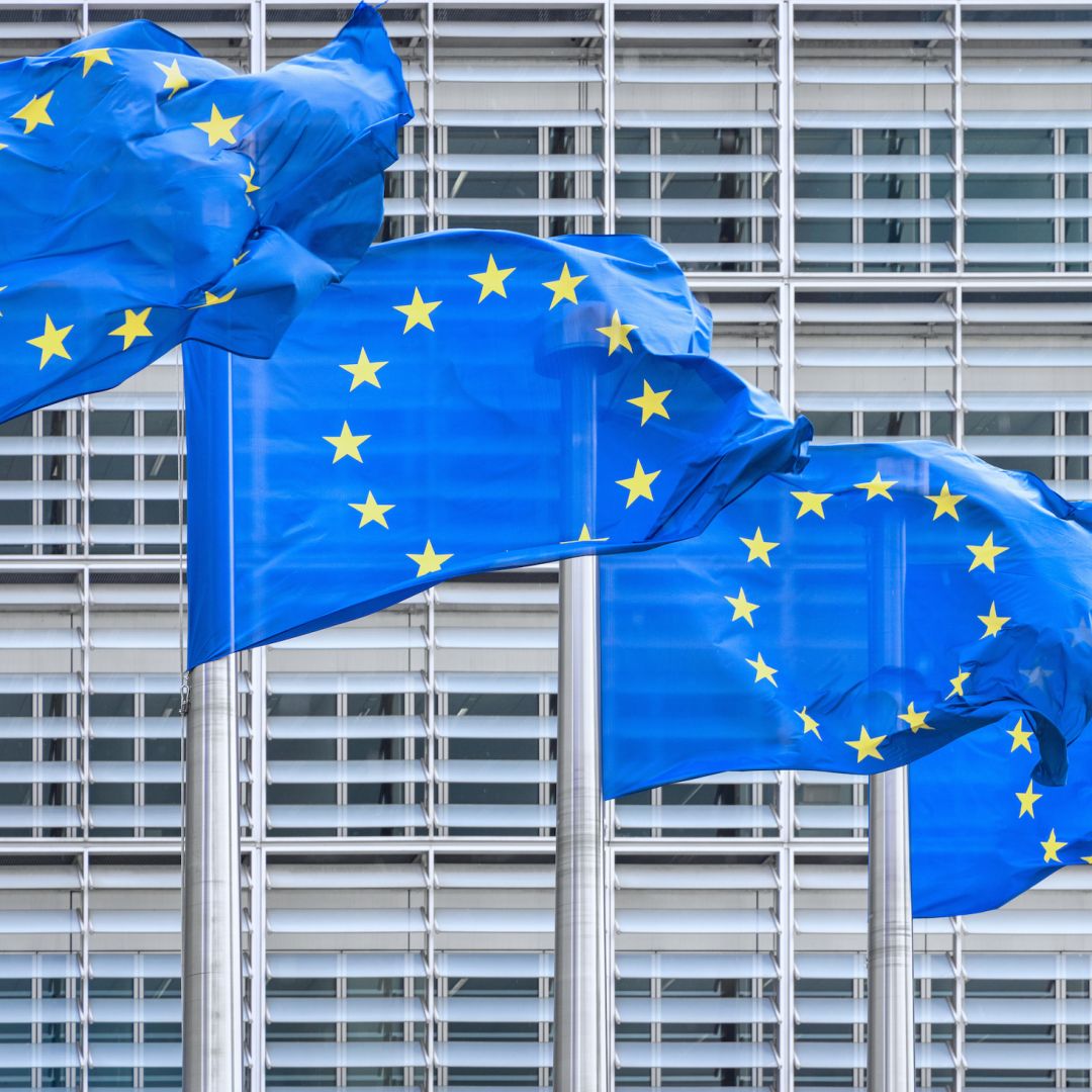 EU flags wave outside the European Commission headquarters in Brussels, Belgium. EU flags wave outside the European Commission headquarters in Brussels, Belgium.