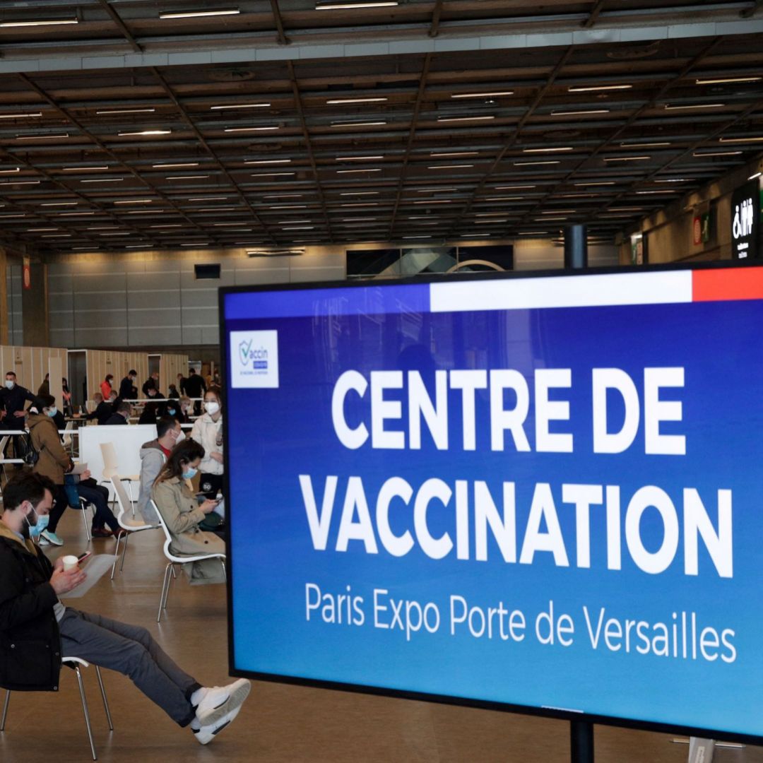 People wait to be vaccinated at the COVID-19 vaccination center May 15, 2021, at the Porte de Versailles in Paris.