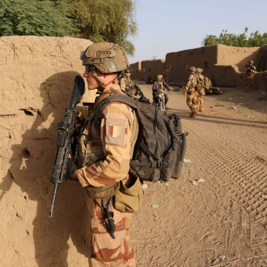 French soldiers patrol the streets in a village located in Mali’s Gao region on Dec. 4, 2021. French soldiers patrol the streets in a village located in Mali’s Gao region on Dec. 4, 2021.