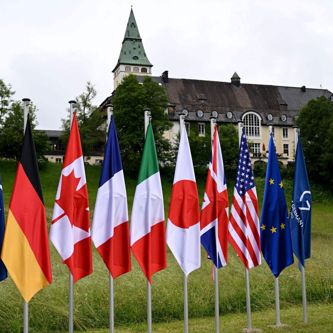 The flags of the G-7 countries and the European Union are seen on June 28, 2022, in front of Elmau Castle in southern Germany during this year's G-7 Summit.