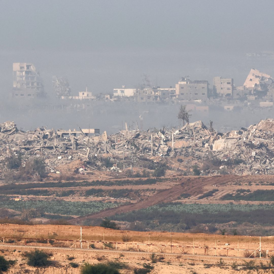 A picture taken from southern Israel near the border with the Gaza Strip on Dec. 4, 2023, shows smoke lingering over the Palestinian territory following Israeli bombardment amid continuing battles between Israel and the militant group Hamas.