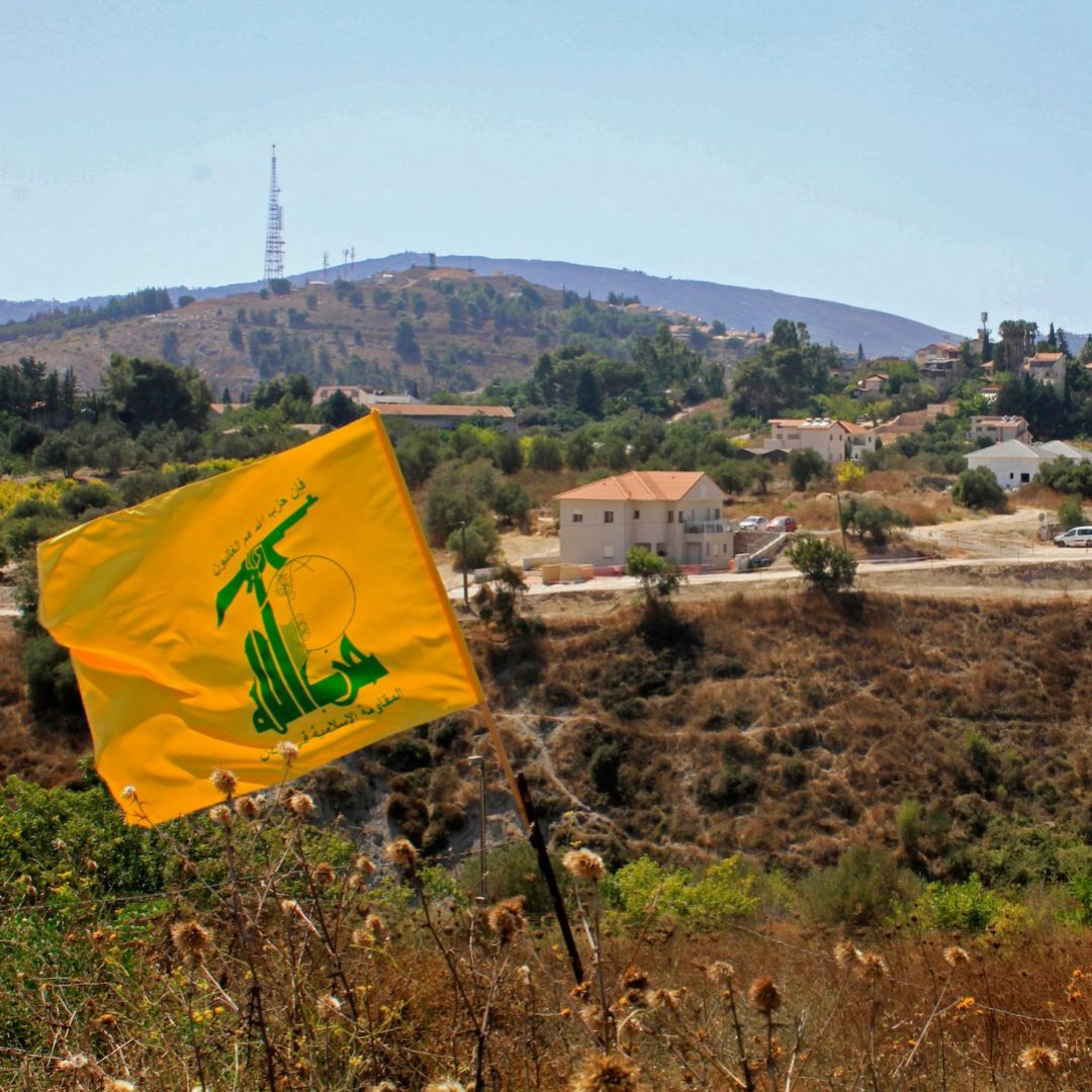 A Hezbollah flag flutters on the Lebanese side of the border with Israel on Sept. 2, 2019. 