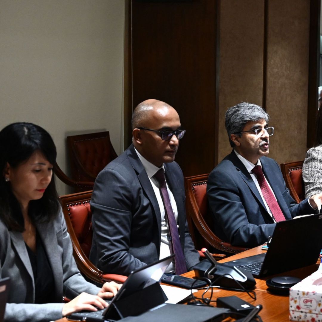 International Monetary Fund representative Rahul Anand (center) speaks during a press conference in Dhaka, Bangladesh, on Nov. 9, 2022. 