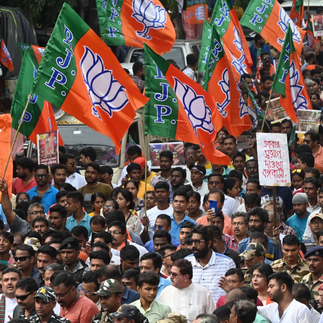 Supporters of India's ruling Bharatiya Janata Party (BJP) participate in a rally in Kolkata on July 19, 2023. 