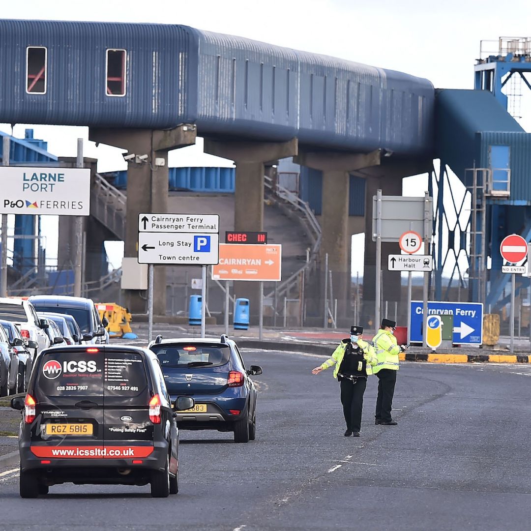 Officers man a checkpoint at a harbor in Larne, Northern Ireland, on Feb. 10, 2021. 