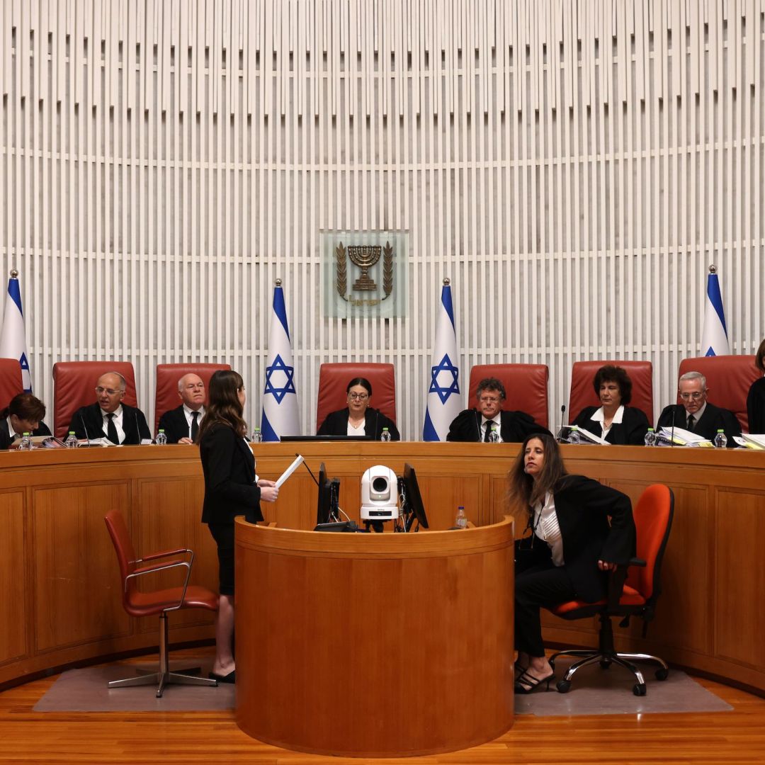 The president of Israel's Supreme Court, Esther Hayut (center), and judges assemble on Sept. 28, 2023, to hear petitions against a law that blocks the court from potentially ordering the prime minister to recuse himself from office. The president of Israel's Supreme Court, Esther Hayut (center), and judges assemble on Sept. 28, 2023, to hear petitions against a law that blocks the court from potentially ordering the prime minister to recuse himself from office.
