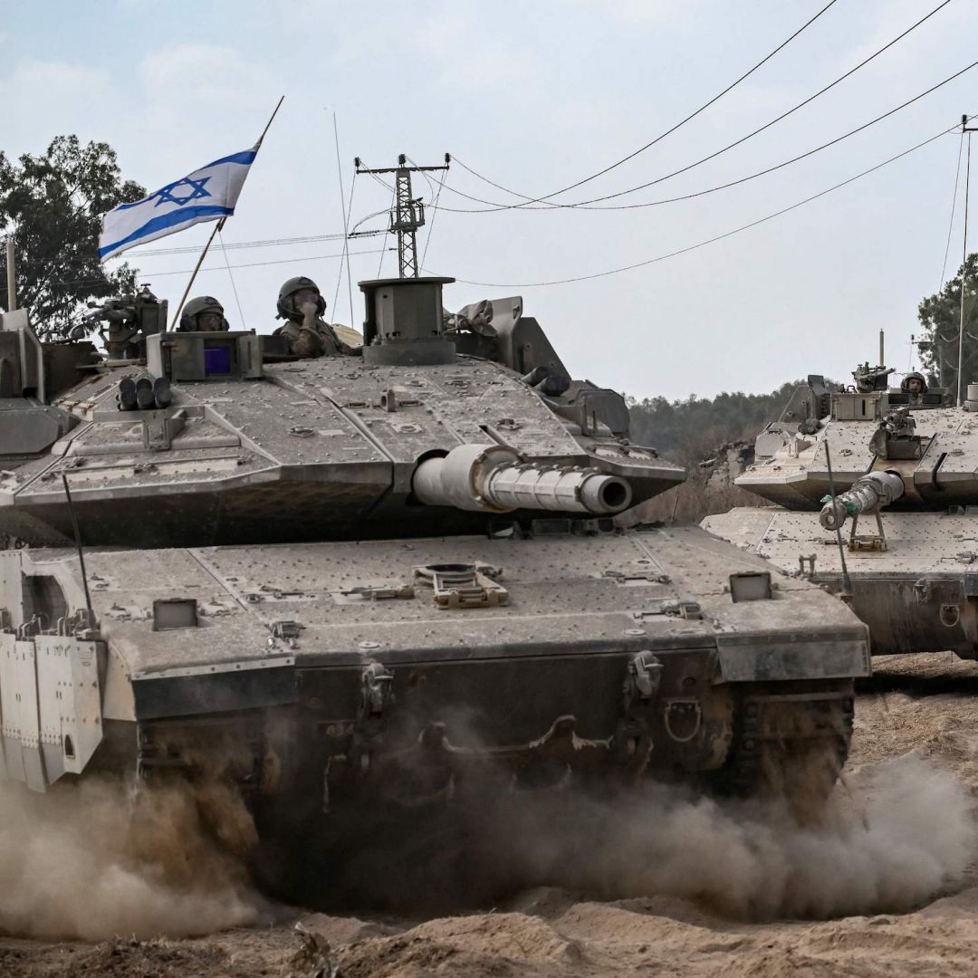 Israeli army Merkava battle tanks deploy Oct. 13, 2023, with the Gaza Strip in southern Israel. 
