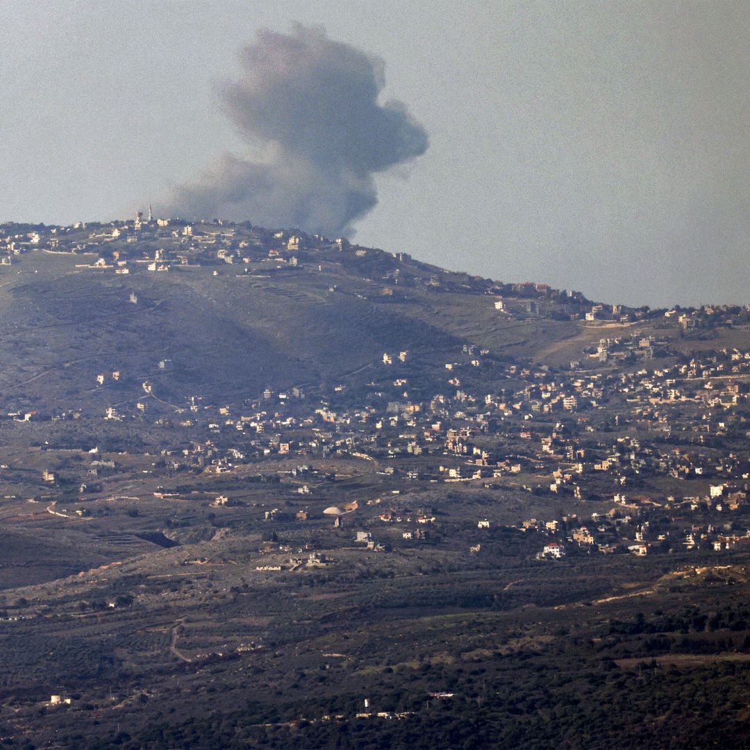 Smoke billows across the horizon along the hills in southern Lebanon from Israeli bombardment along the two countries' border on Dec. 10, 2023. 