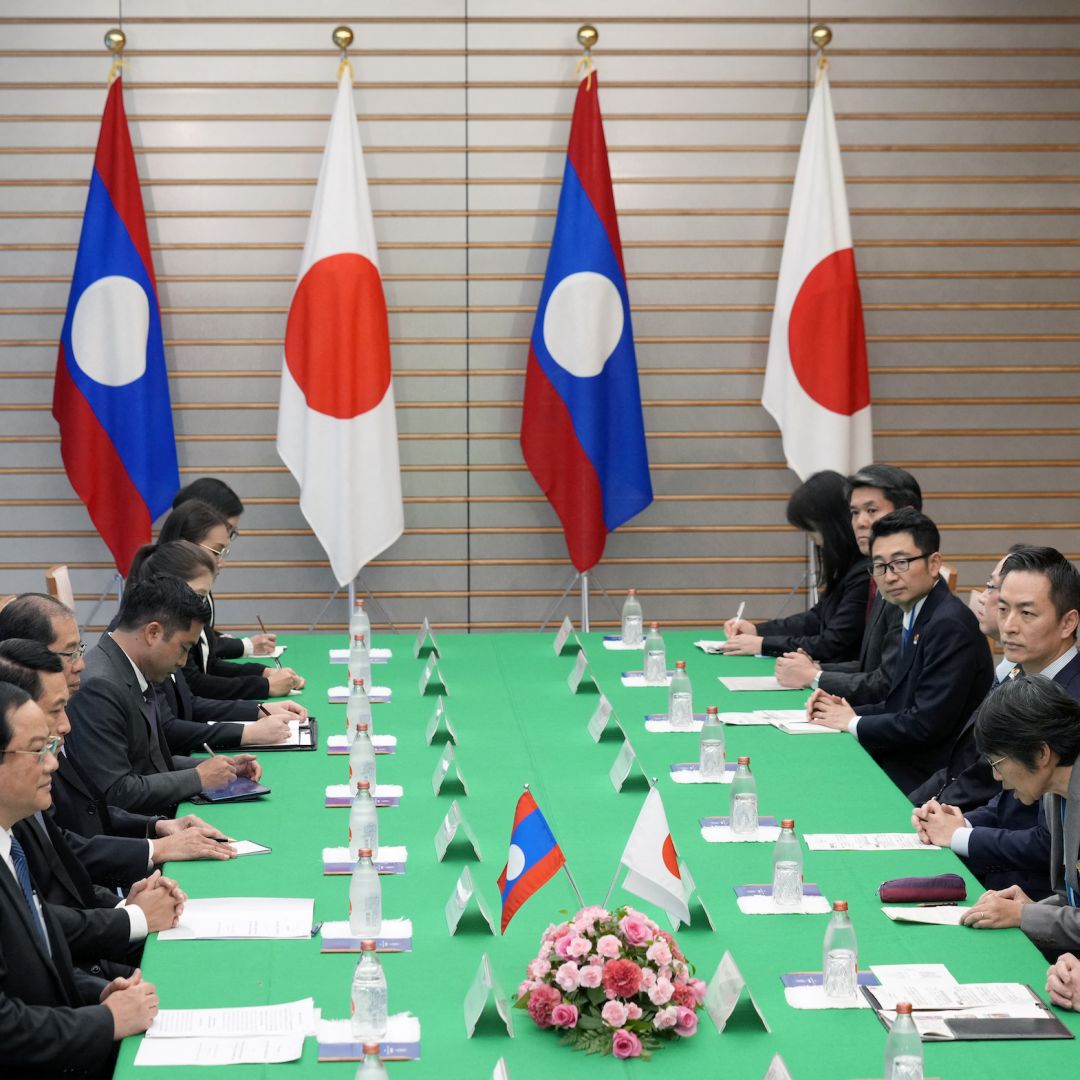 Japan's Prime Minister Fumio Kishida (R) delivers an opening address at the start of a bilateral meeting with Laos' Prime Minister Sonexay Siphandone (L) at the prime minister's official residence in Tokyo, Japan, on Dec. 16, 2023.