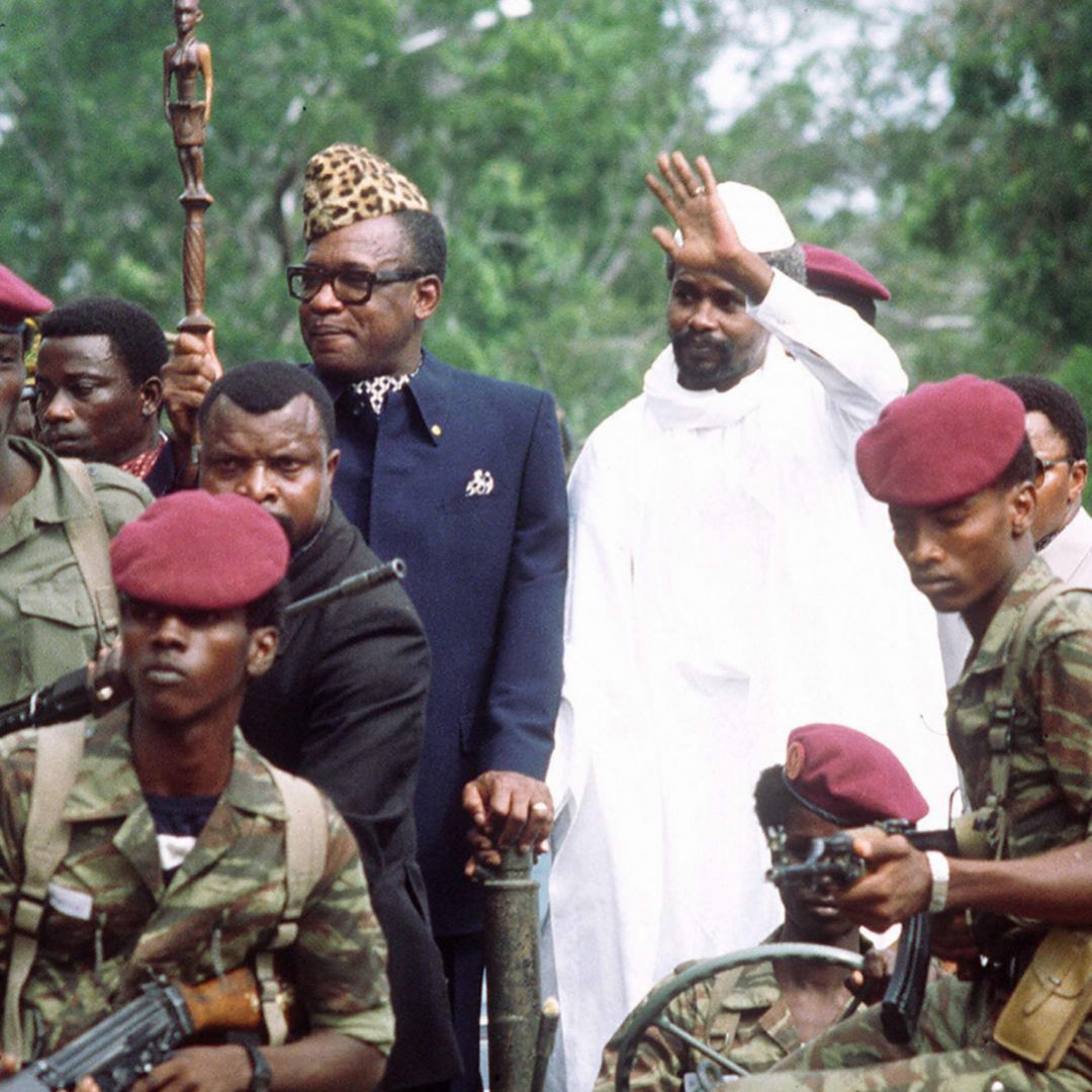 Hissene Habre (R), then-president of Chad, greets Mobutu Sese Seko (L), then-president of Zaire, on his arrival in Ndjamena on Aug. 20, 1983. For African leaders in charge of poor, weak states, maintaining personal security is a perennial challenge.