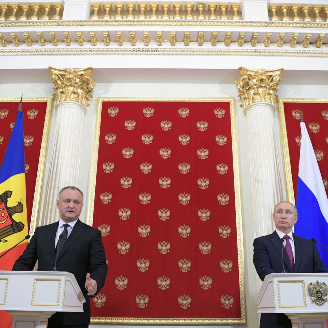 Moldovan President Igor Dodon (left) speaks during a news conference with Russian counterpart Vladimir Putin. Dodon favors a shift toward Moscow. Moldovan President Igor Dodon (left) speaks during a joint conference with his Russian counterpart, Vladimir Putin, at the Kremlin in Moscow on Jan. 17, 2017.