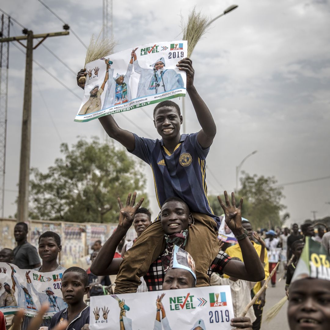Nigerian President Muhammadu Buhari appears set to return for a second term, but fallout from the contentious polls could imperil his efforts to keep the peace in the Niger Delta. All Progressives Congress party supporters rally in Kano, Nigeria, as they celebrate the reelection of Muhammadu Buhari on Feb. 27, 2019.