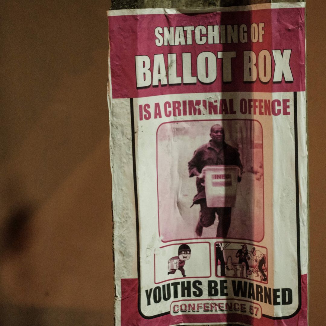 A warning poster is shown in Lagos, Nigeria, ahead of presidential and legislative elections on Feb. 16.