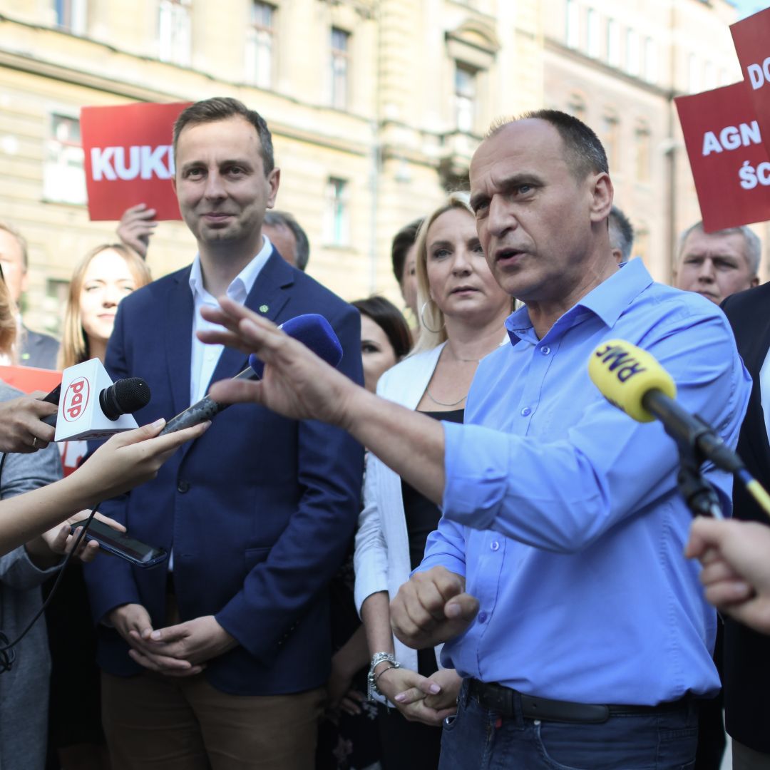 The popularity of Poland's ruling Law and Justice party if forcing opposition parties such as the party of Pawel Kukiz, shown here speaking to the press in Krakow on Sept. 4, into weighing alliances ahead of October's general elections. Pawel Kukiz, leader of Poland's Kukiz' 15 party, speaks to the press in Krakow on Sept. 4, 2019, about the Polish Coalition, an alliance between his party and the Polish People's Party formed to compete in Poland's general elections this fall.