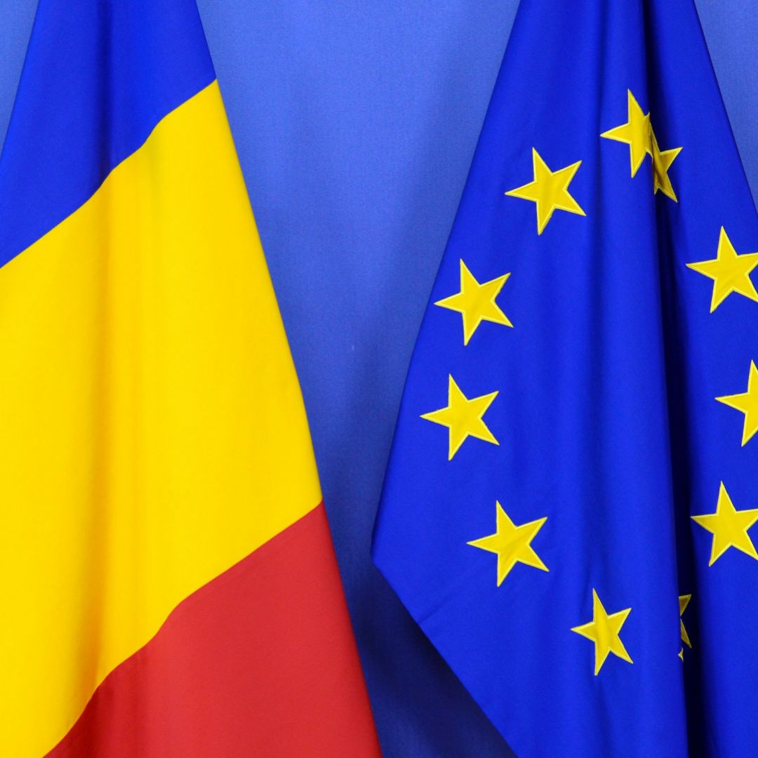 The Romanian and EU flags are seen at the European Commission's headquarters in Brussels, Belgium in February 2017.