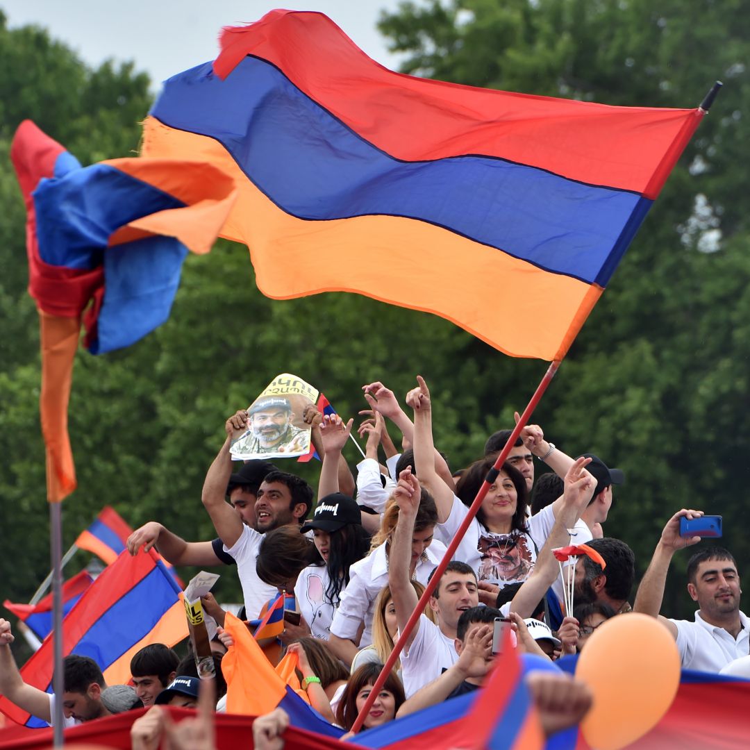 Supporters of Armenian Nikol Pashinian celebrate in Yerevan's Republic Square on May 8, 2018. Pashinian would go on to become prime minister.