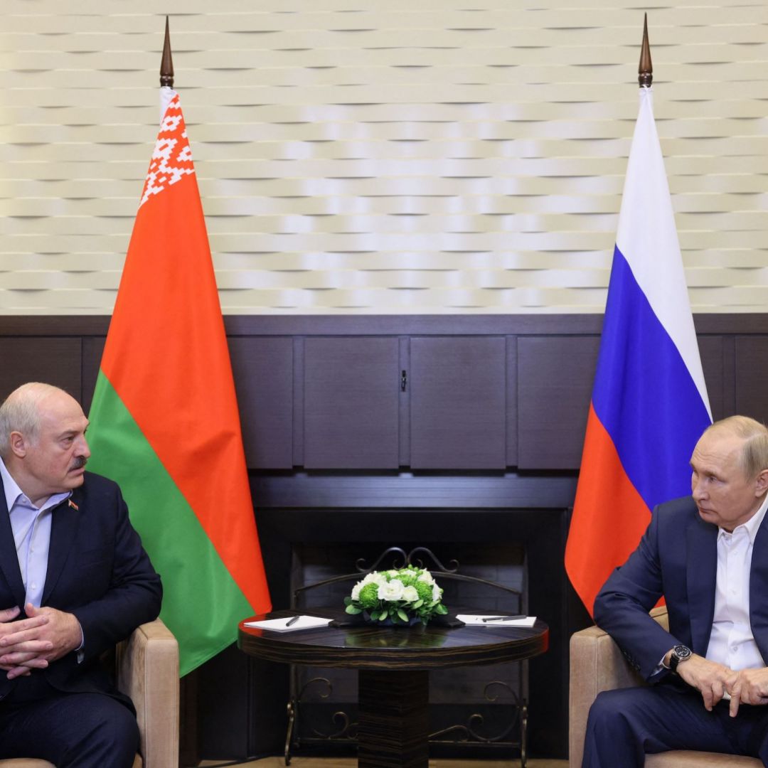 Russian President Vladimir Putin (right) meets with his Belarusian counterpart Alexander Lukashenko in Sochi, Russia, on Sept. 26, 2022. 