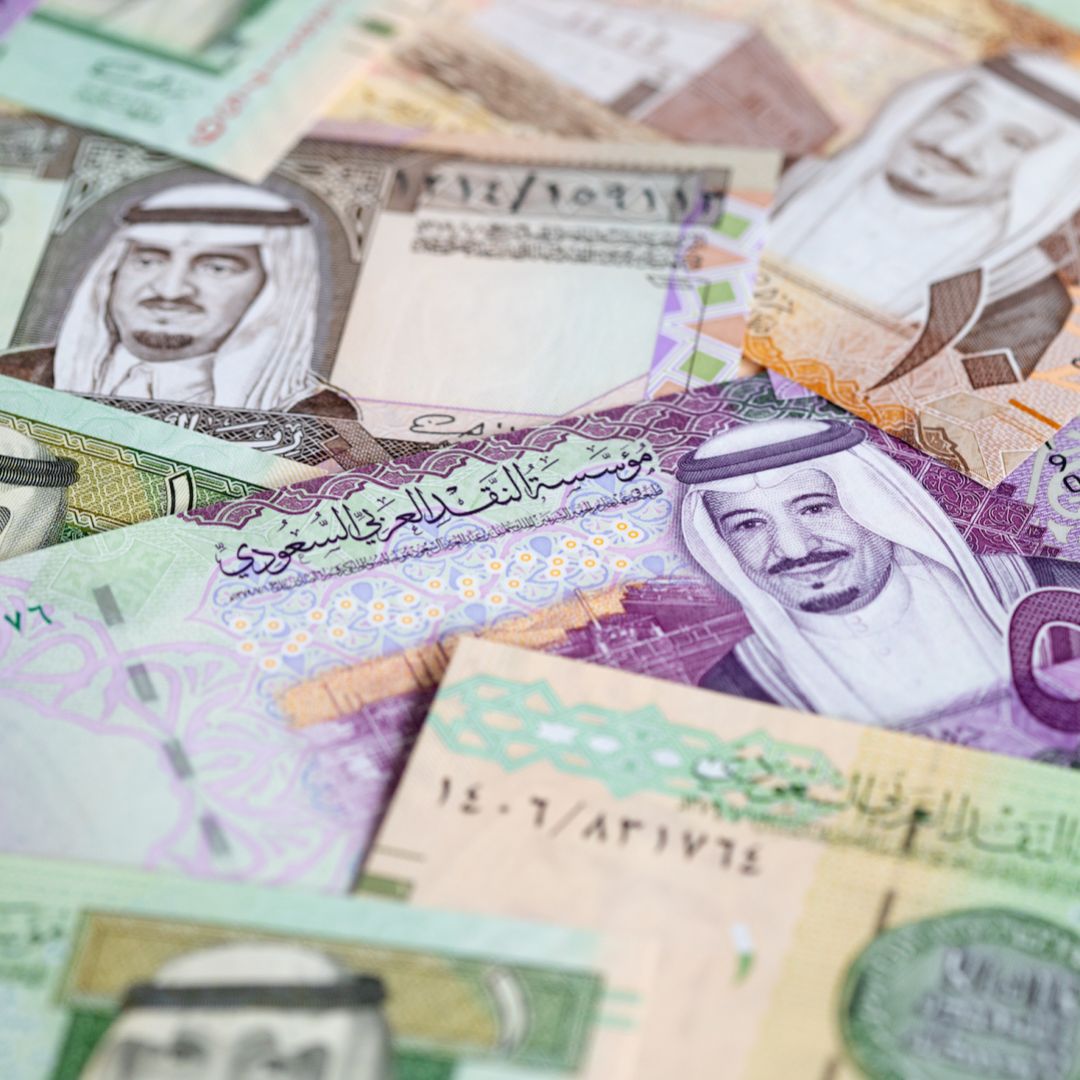 A collection of Saudi riyal banknotes. 