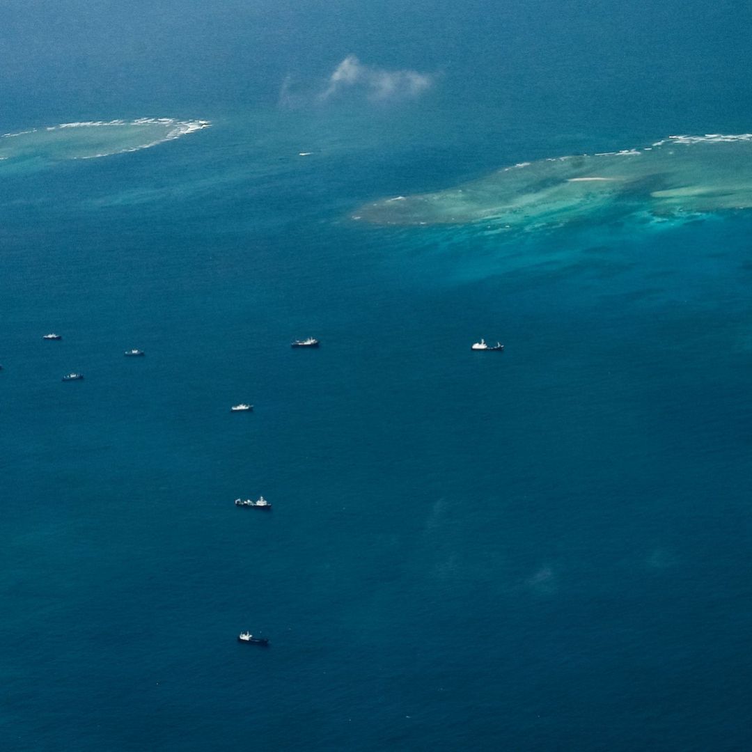 Chinese maritime militia vessels float near the Philippine-controlled island of Thitu, which Filipinos call Pag-asa, in the contested Spratly Islands in the South China Sea on March 9, 2023.