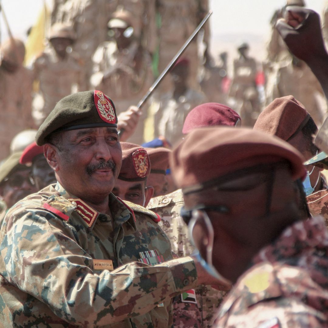 Sudanese Gen. Abdel Fattah al-Burhan on Dec. 8, 2021, in the Maaqil area of northern Nile River state. The Sudanese junta's efforts will likely meet strong resistance from pro-democracy groups and, if passed, accelerate Sudan's isolation from the West and further economic decline. Sudanese Gen. Abdel Fattah al-Burhan on Dec. 8, 2021, in the Maaqil area of northern Nile River state.