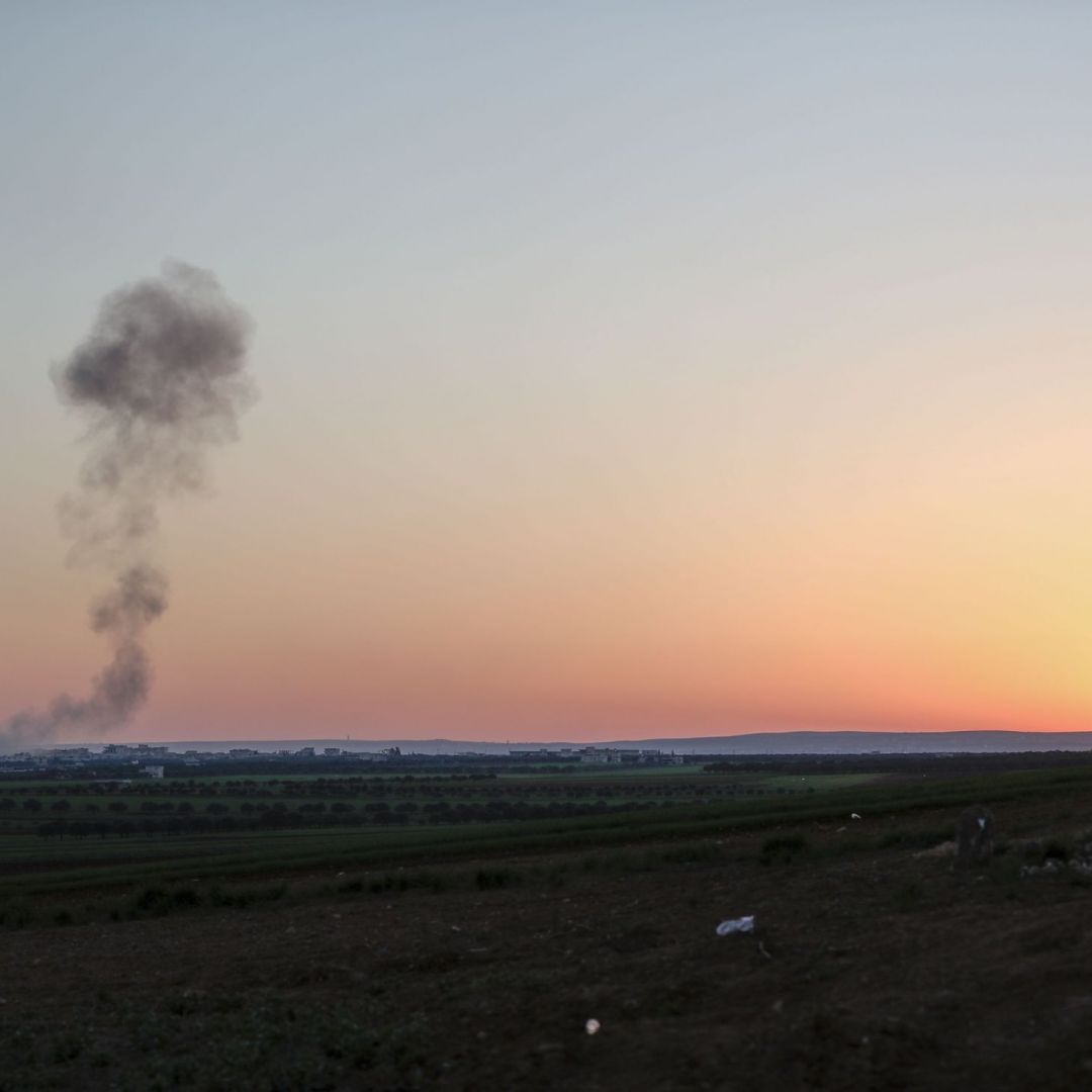 Smoke billows above a Syrian village following an airstrike raid on March 3, 2020. 