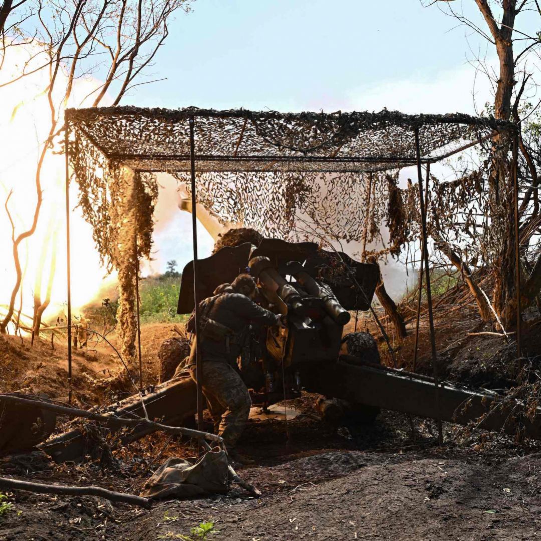 A Ukrainian artilleryman fires a 152 mm towed gun-howitzer D-20 at Russian positions near Bakhmut, eastern Ukraine, on July 20, 2023. A Ukrainian artilleryman fires a 152 mm towed gun-howitzer D-20 at Russian positions near Bakhmut, eastern Ukraine, on July 20, 2023.