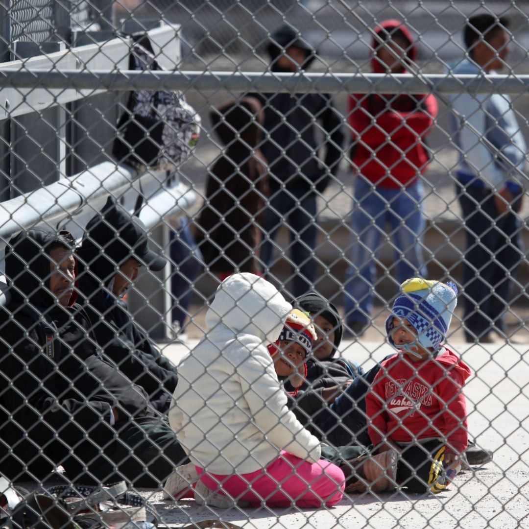 Migrants wait in a detention area on March 31, 2019, in El Paso, Texas.