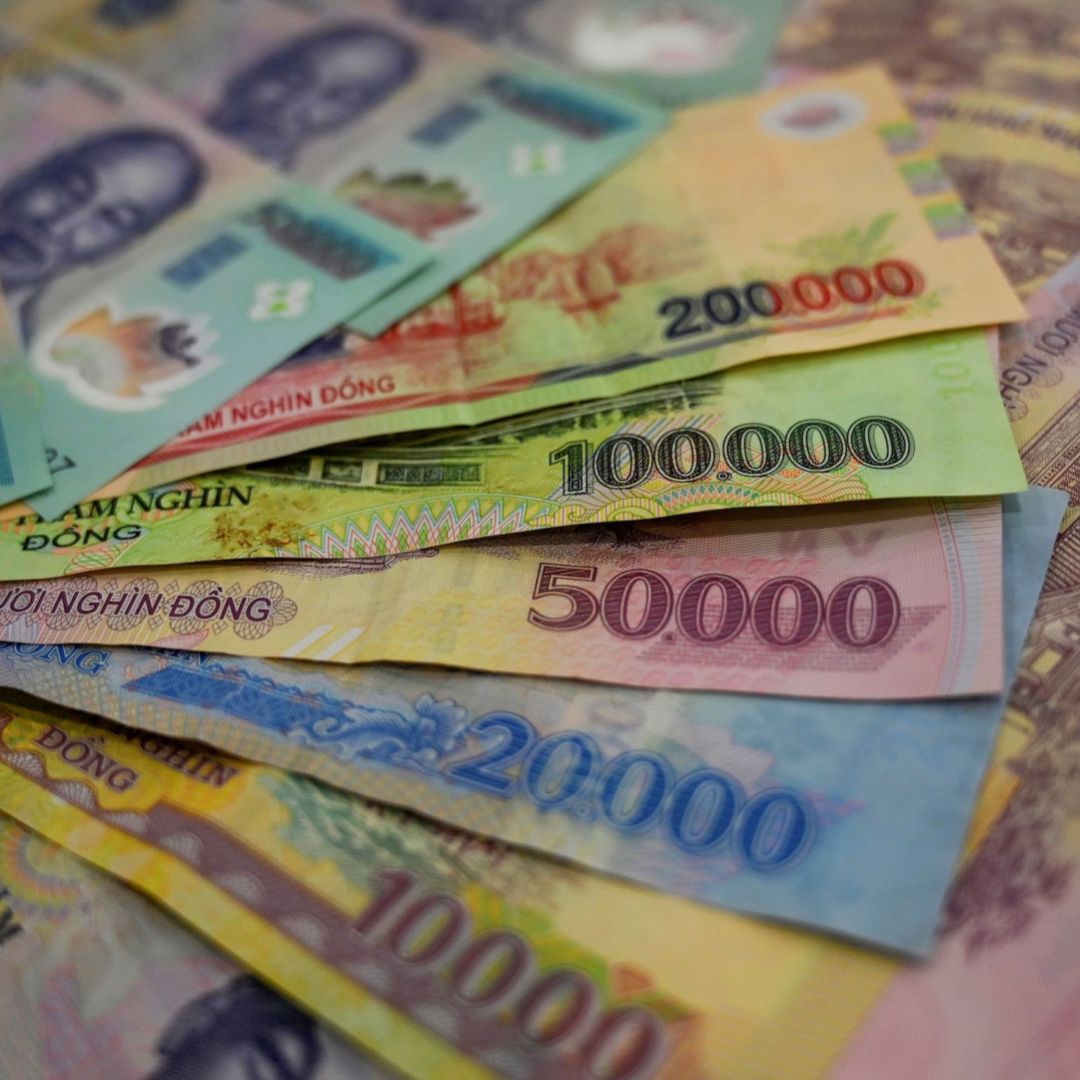 A photo illustration shows banknotes of the Vietnamese dong. A photo illustration shows banknotes of the Vietnamese dong.