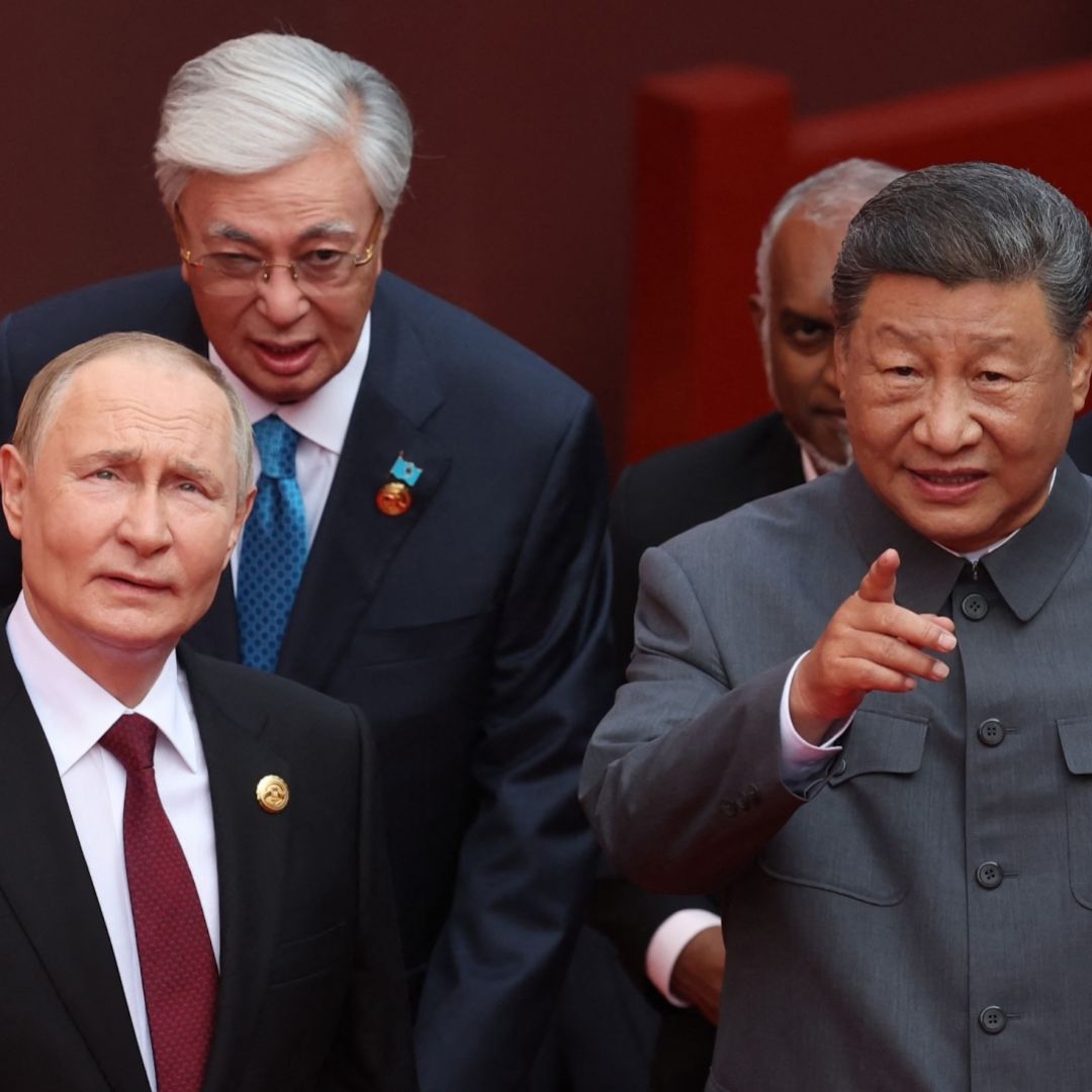 Russian President Vladimir Putin (L) and Chinese President Xi Jinping on Sept. 3, 2025, in Beijing's Tiananmen Square.