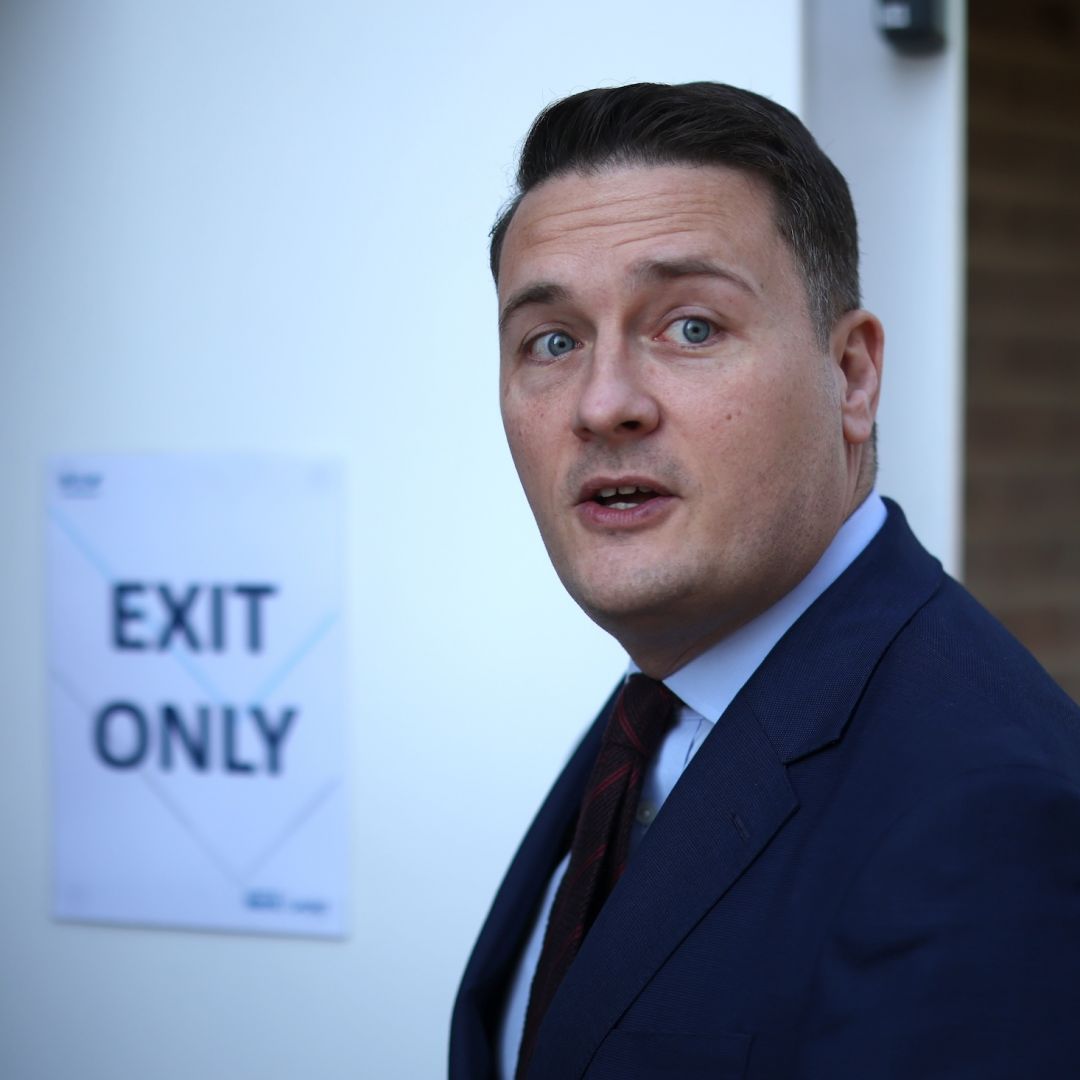 U.K. Health Secretary Wes Streeting arrives at the University of Kent in Canterbury, England, on March 19, 2026, as students receive the Meningitis B vaccine.