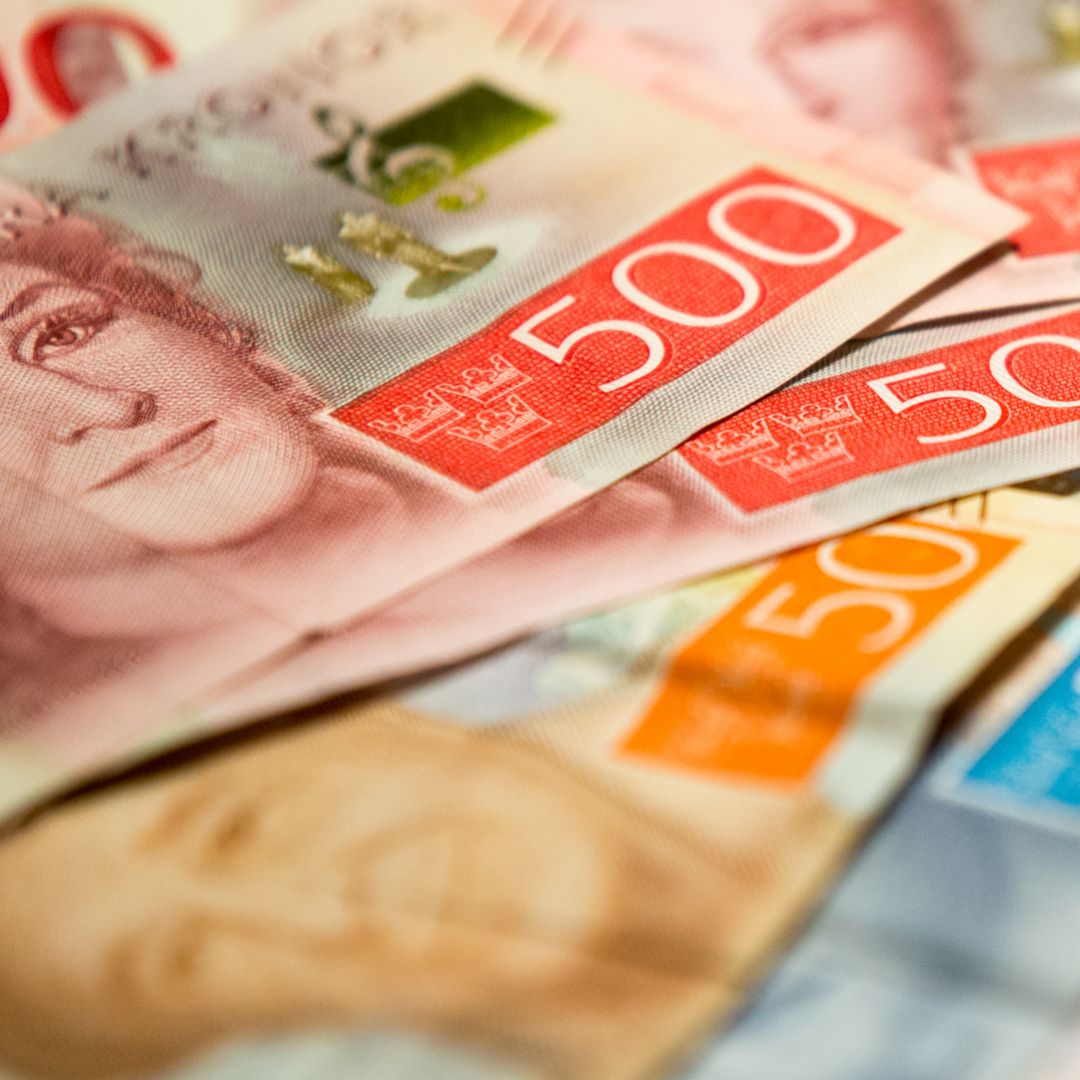 This photo illustration displays Swedish krona banknotes.