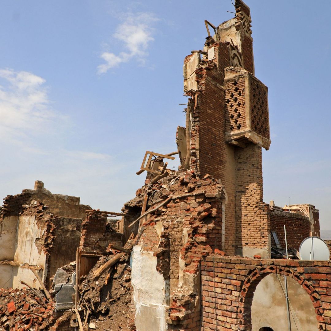 A partial view shows a collapsed UNESCO-listed building in the old city of the Yemeni capital Sanaa on Aug. 10 following heavy rains. 