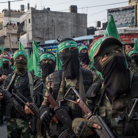 Palestinian Hamas militants are seen during a military show in Gaza City, Gaza, on July 20, 2017.