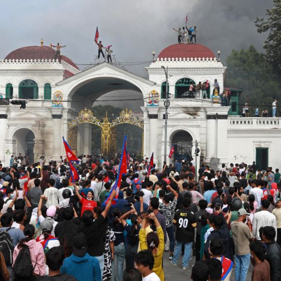 Protesters gather at the Singha Durbar, the main administrative building for the Nepal government, in Kathmandu on Sept. 9, 2025. Protesters gather at the Singha Durbar, the main administrative building for the Nepal government, in Kathmandu on Sept. 9, 2025.