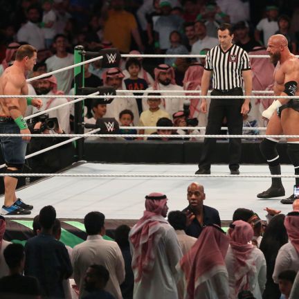 John Cena (L) competes with Triple H during the World Wrestling Entertainment (WWE) Greatest Royal Rumble event in Jeddah on April 27. Controversy or not, the WWE is muscling in on more cash by returning to Saudi Arabia for another event. John Cena (L) competes with Triple H during the World Wrestling Entertainment (WWE) Greatest Royal Rumble event in Jeddah on April 27.
